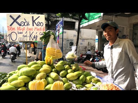 Thanh niên thật thà bán xoài keo vàng Campuchia bao cân đủ ký, gọt xoài nhanh như máy Thanh niên thật thà bán xoài keo vàng Campuchia bao cân đủ ký, gọt xoài nhanh như máy